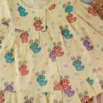 A Caterpillar - Muslin Frill Frock - Image 2