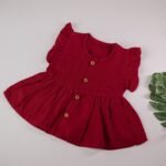 Maroon Muslin Baby Frock with Wooden Buttons – Soft & Stylish